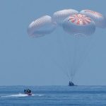 Nasa SpaceX crew return: Dragon capsule splashes down